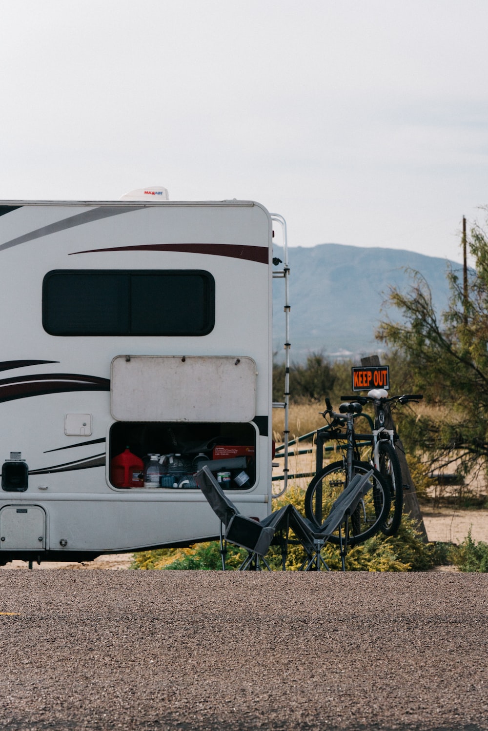 shallow focus photo of white RV trailer